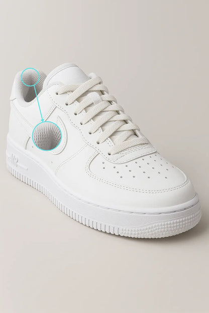 Tênis branco estilo NK Air Force com visual frontal, cabedal em couro, cadarço branco e acabamento esportivo ideal para moda urbana.