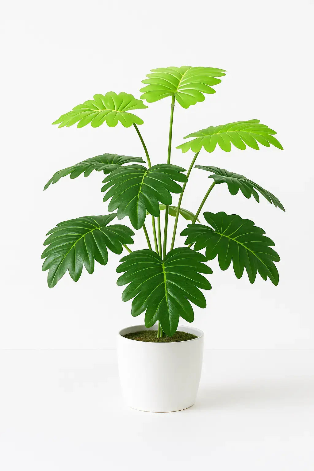 Vaso com planta artificial Costela de Adão em tons de verde escuro e claro, ideal para decoração de interiores com estilo natural.